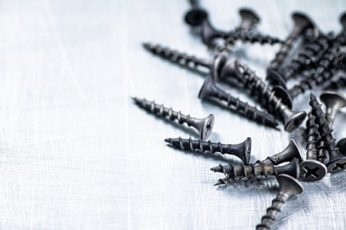 Preview: A bunch of self-tapping screws on the table.