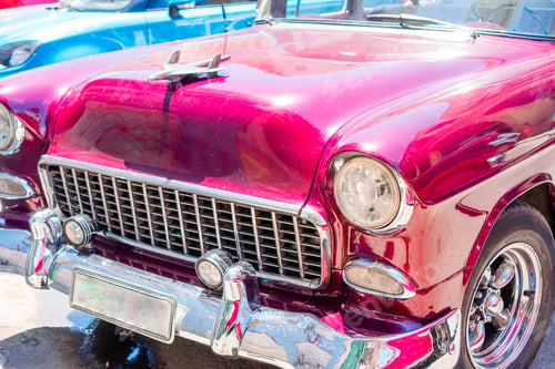 Preview: View of yellow classic vintage car in Old Havana, Cuba