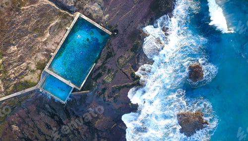 Preview: ✨ nominated✨.
Ocean pool taken from the air with blue water and waves