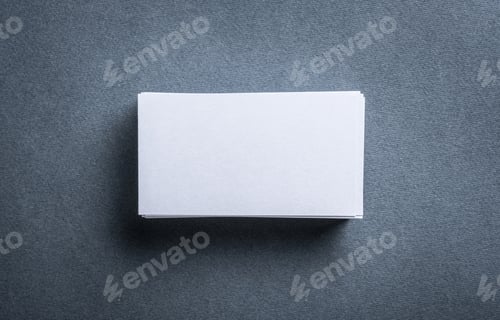 Preview: Blank white business card on grey background