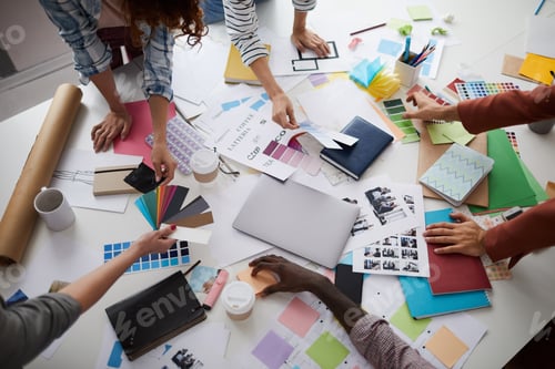 Preview: Creative Designers Discussing Production over Table
