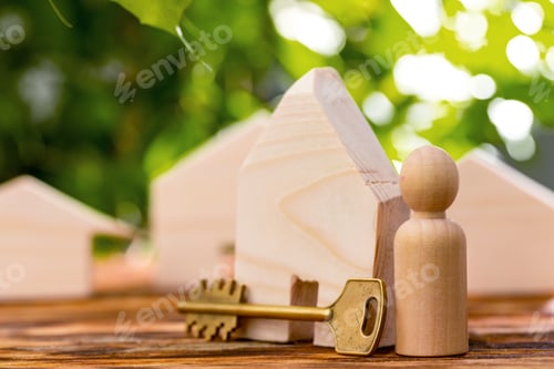 Preview: Wooden toy house and house keys close up