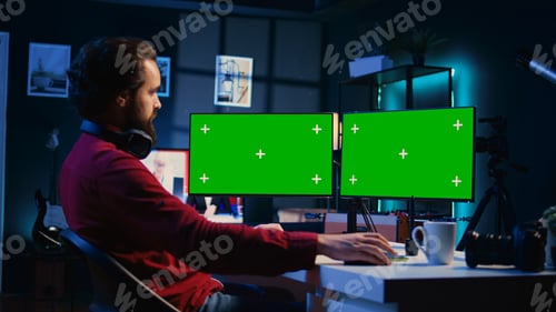 Preview: Photographer using photo editing software on mockup multi monitors setup to improve images quality