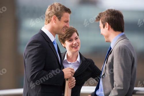 Preview: Business people talking outdoors