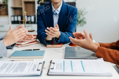 Preview: Asian team and lawyers discussing contract papers coworker, teamwork celebrating