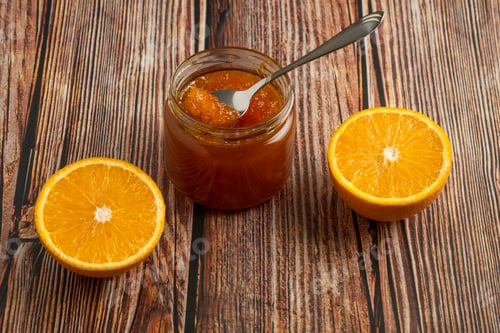 Preview: Orange confiture in a glass jar