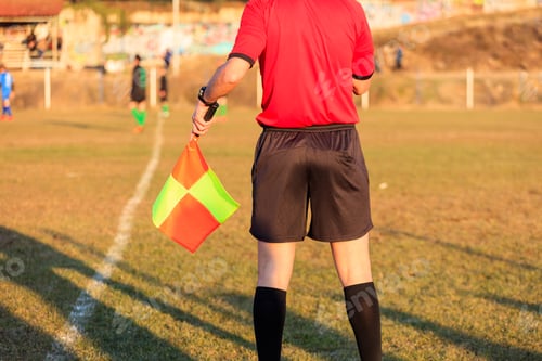 Preview: Football assistant referee in action