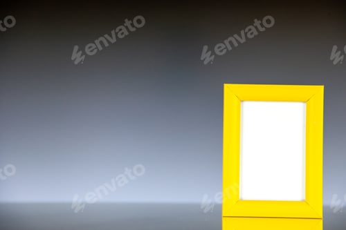 Preview: front view yellow picture frame on dark background portrait family color gift present photo shoot