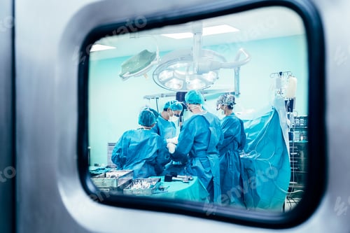 Preview: Surgical Team Performing Operation in Sterile Environment