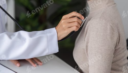Preview: Doctor and Patient Consultation in Modern Clinic Setting for Health Examination and Medical Advice
