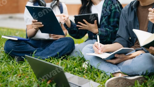 Preview: Asian Students are studying the campus park. Young people are spending time together.