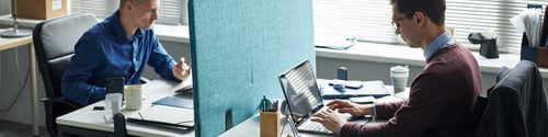 Preview: Caucasian Young Men Working on Laptops in Modern Office Workspace