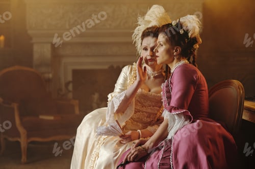 Preview: Two Caucasian Young Adult Women Whispering Secrets in Baroque Interior Setting