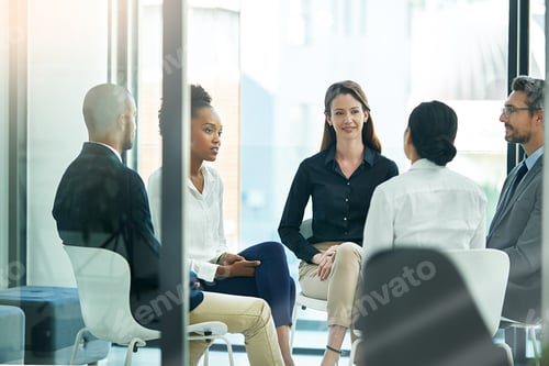 Preview: Shot of a diverse group of businesspeople having a meeting in the boardroom