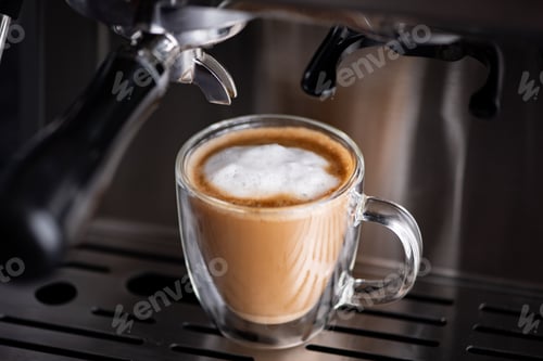 Preview: Cup of freshly brewed espresso topped with foam