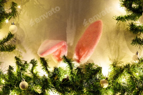 Preview: Rabbit ears in the christmas tree on white background.