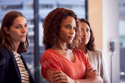 Preview: Three Businesswomen Standing In Modern Open Plan Office Together