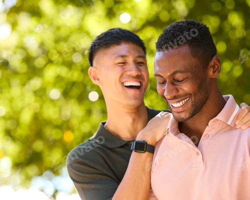 Preview: Close Up Of Same Sex Male Couple Or Friends Outdoors Hugging Relaxing In Countryside Together
