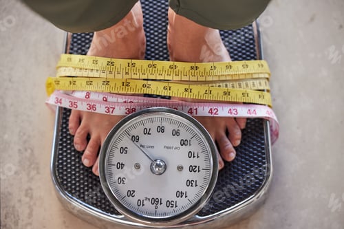 Preview: Top view, feet on scale and tape to lose weight, health and diet for wellness, balance and fitness.