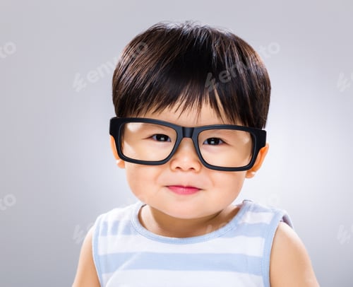 Preview: Baby boy wearing glasses