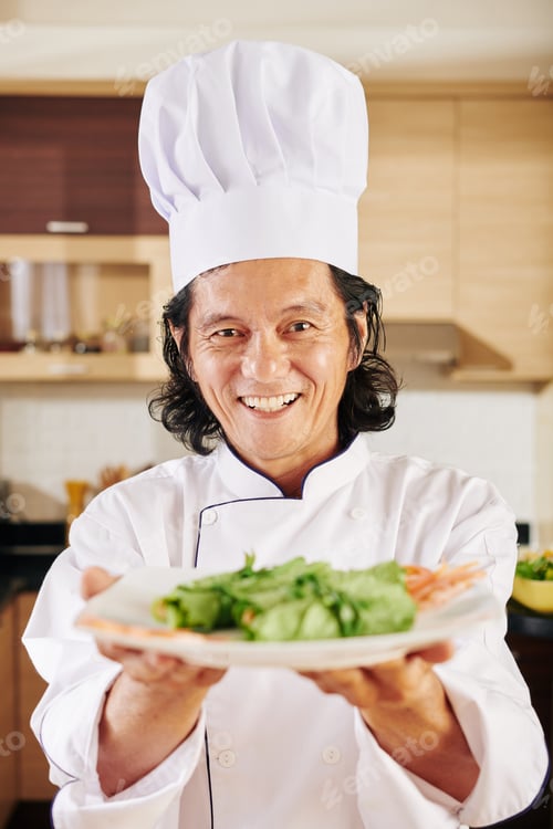 Preview: Chef giving plate of salad