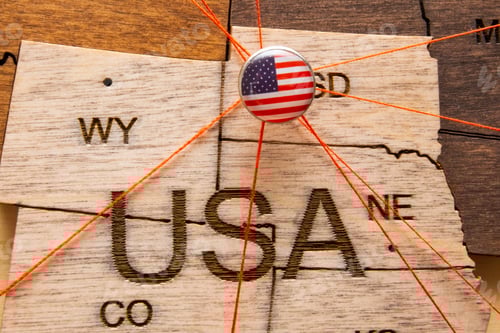 Preview: USA flag on the pin with red thread showed the paths on the wooden map.