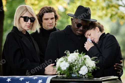 Preview: Woman crying at funeral