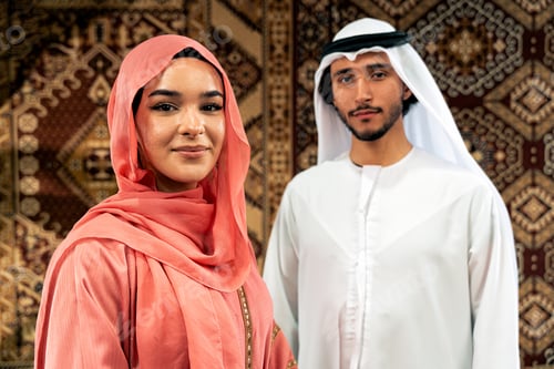 Preview: Young couple from Emirati spending time in a cafe