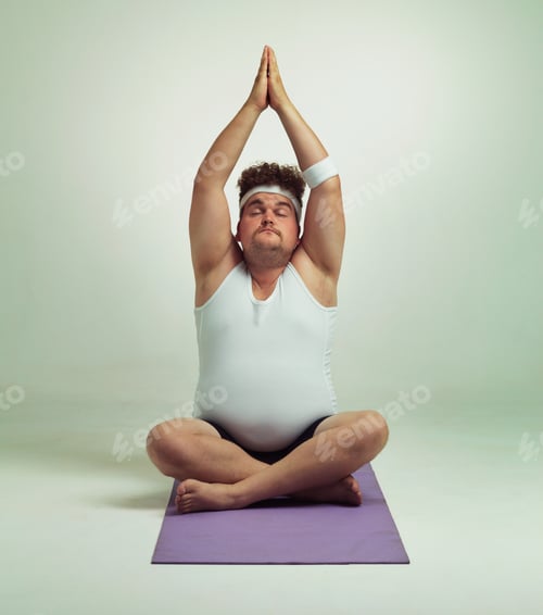Preview: Being fit is easy especially with yoga. An overweight man doing a yoga pose.