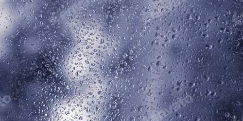 Preview: Water drops on wet window, raindrops on blue window glass. Selective focus, bokeh. Blurred rainy