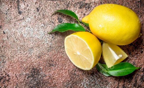 Preview: Ripe lemons with leaves.