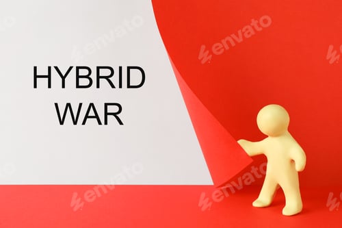 Preview: Human figure made of plasticine showing words Hybrid War on white background hidden behind red paper