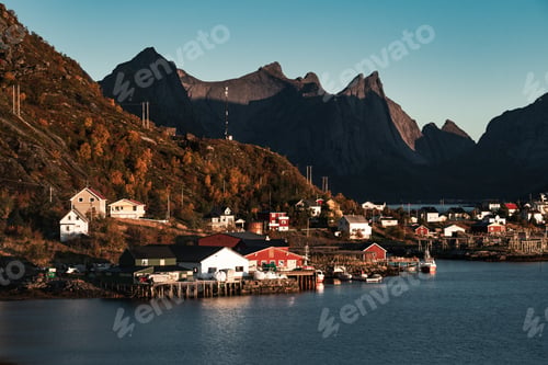 Preview: Mesmerizing shot of the cozy houses surrounded by greenery and water