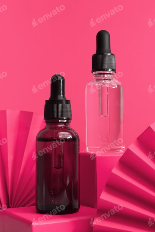 Preview: Skin and body care concept. Pink background with textured folded paper fans.