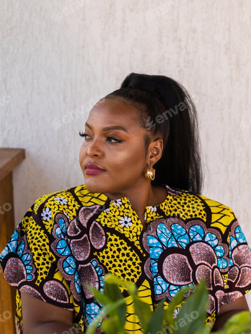 Preview: Portrait of beautiful african american woman having fun on village or suburbian. Outdoor cottagecore