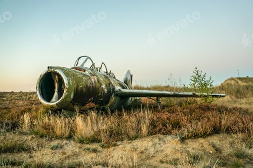 Preview: old rusty airplane lying in field, Belarus, Ruzhany