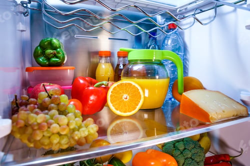 Preview: Open refrigerator filled with food