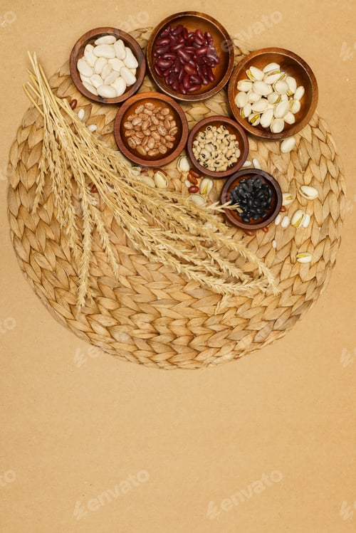 Preview: Flat lay of healthy grains concept, Wheat and various grains in wooden bowl on brown background