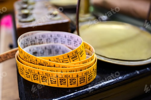 Preview: measuring tapes in a sewing workshop. Rome, Italy