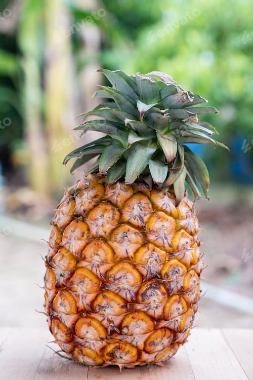 Preview: Ripe pineapple of tropical fruit on wood table