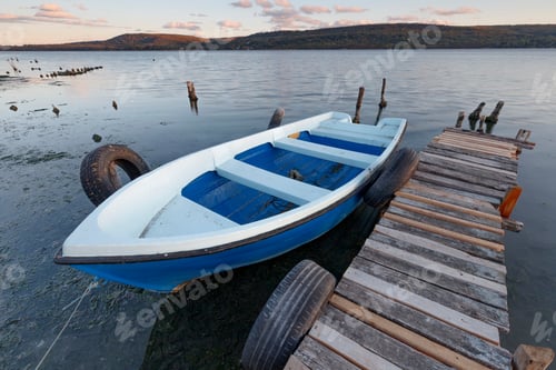 Preview: exciting view of a boat at the wooden pier