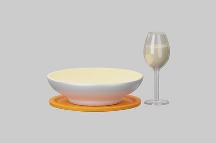 Preview: Ceramic bowl with yellow interior and orange circular object on a plain
