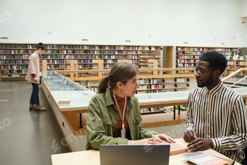 Preview: People working in the library