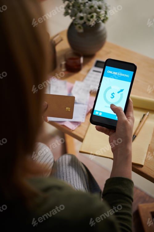 Preview: Woman Using Online Banking App