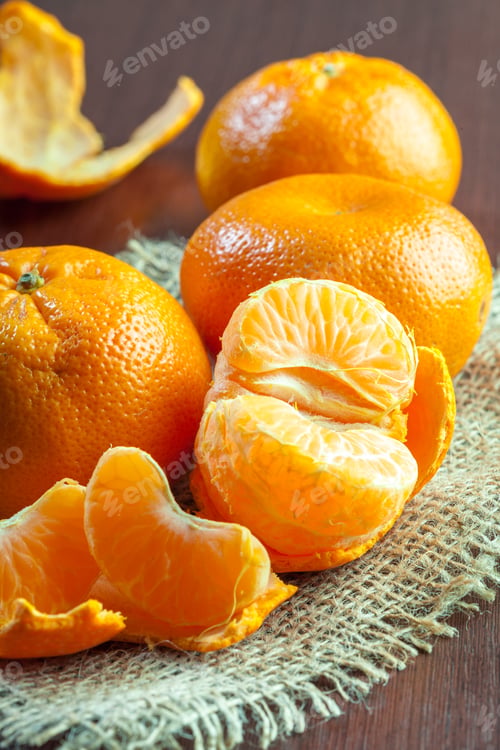 Preview: fresh mandarines on wooden table