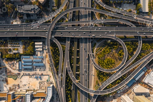 Preview: Aerial drone view of a traffic on a road junction in Wuhan on a sunny day