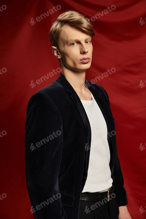 Preview: Young man embodies modern masculinity with striking confidence in bold attire