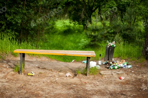 Preview: Overflowing trash can in a recreation Park at the height of a Coronavirus infection.