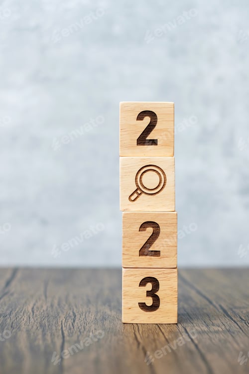 Preview: 2023 block with magnifying glass icon.