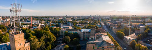 Preview: Panoramic shot of Riga surrounded by greenery under the sunlight in Latvia